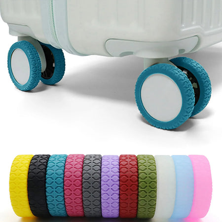 8pcs silicone luggage wheel covers set on a carry-on suitcase