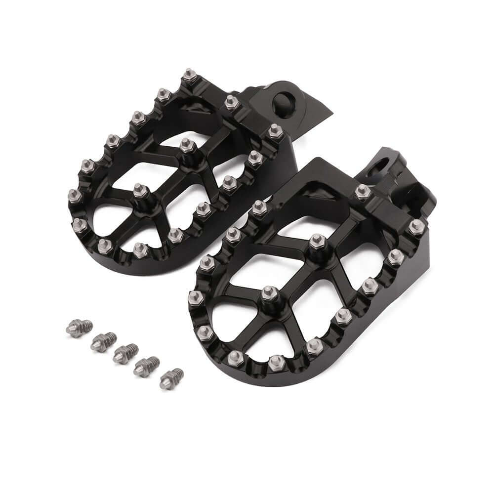 Anodized black and green dirt bike foot pegs for Kawasaki models