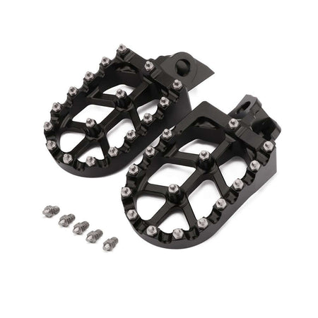 Anodized black and green dirt bike foot pegs for Kawasaki models
