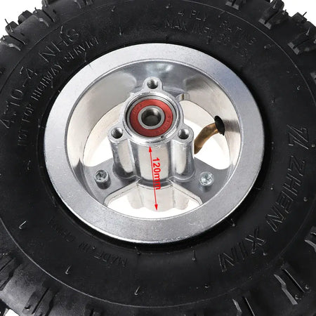Close-up of alloy rim with bearing hub