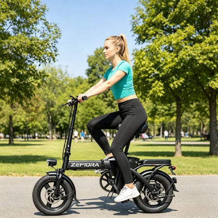 Close-up of the 500W motor and 14-inch wheel on the black e-bike