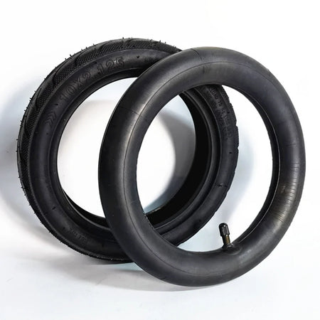 Detailed view of scooter inner tube valve stem and rubber texture