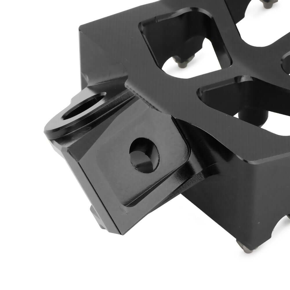 Dirt bike foot pegs with removable steel teeth for better traction