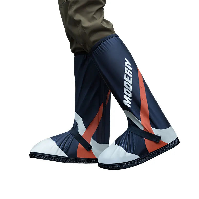 Durable waterproof fabric shoe covers protecting boots from heavy rain and deep puddles.