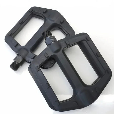 Flat wide bicycle pedals for better grip and stability
