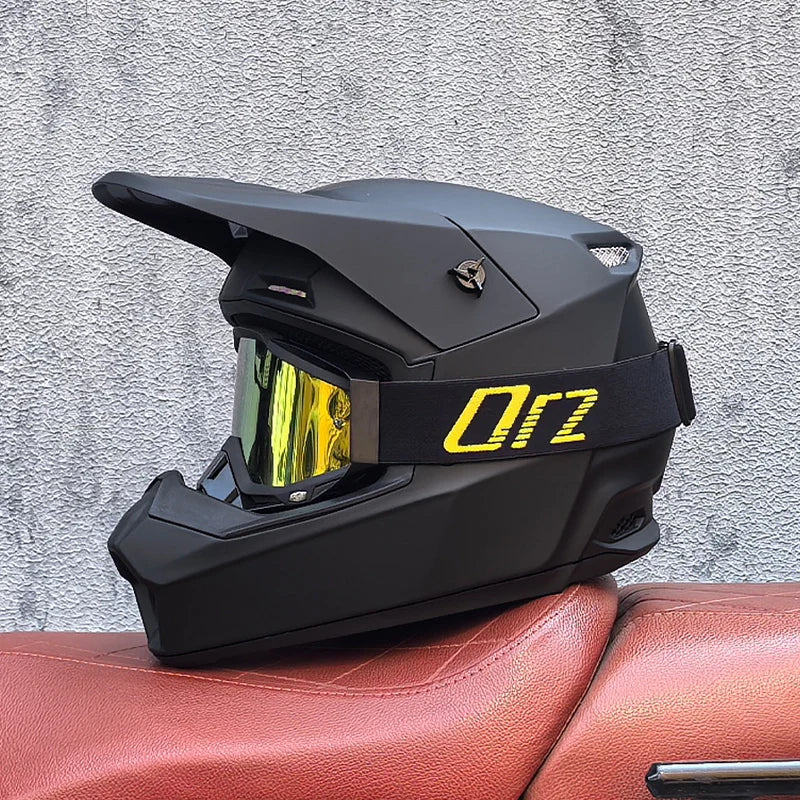 Full face helmet with abrasion resistant outer shell