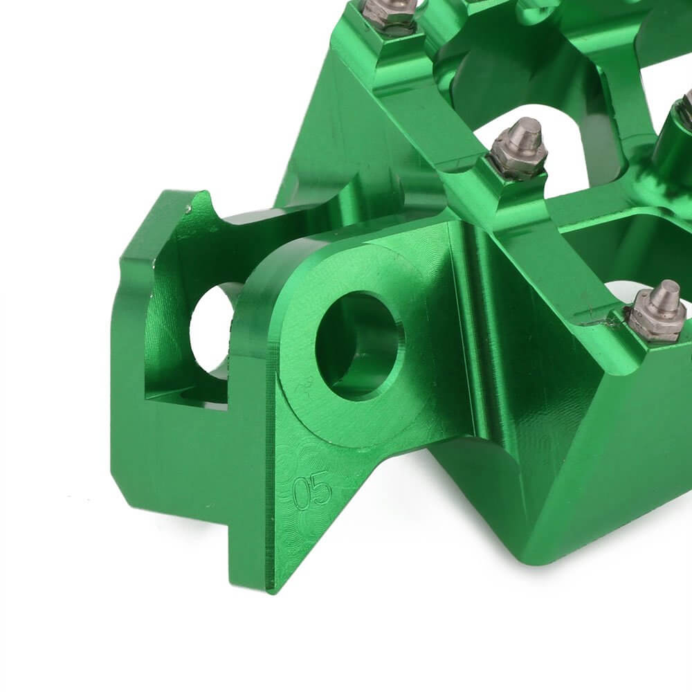 Motocross foot pegs anti slip design for muddy riding conditions