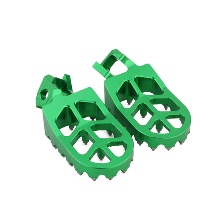 Non slip motocross foot pegs with replaceable steel teeth