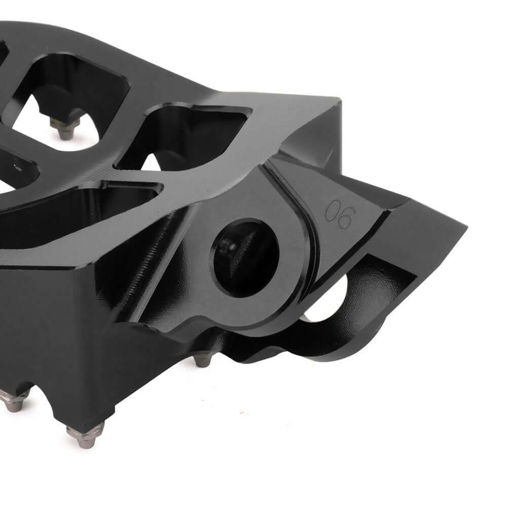 Non slip off road motorcycle foot pegs for muddy terrain riding