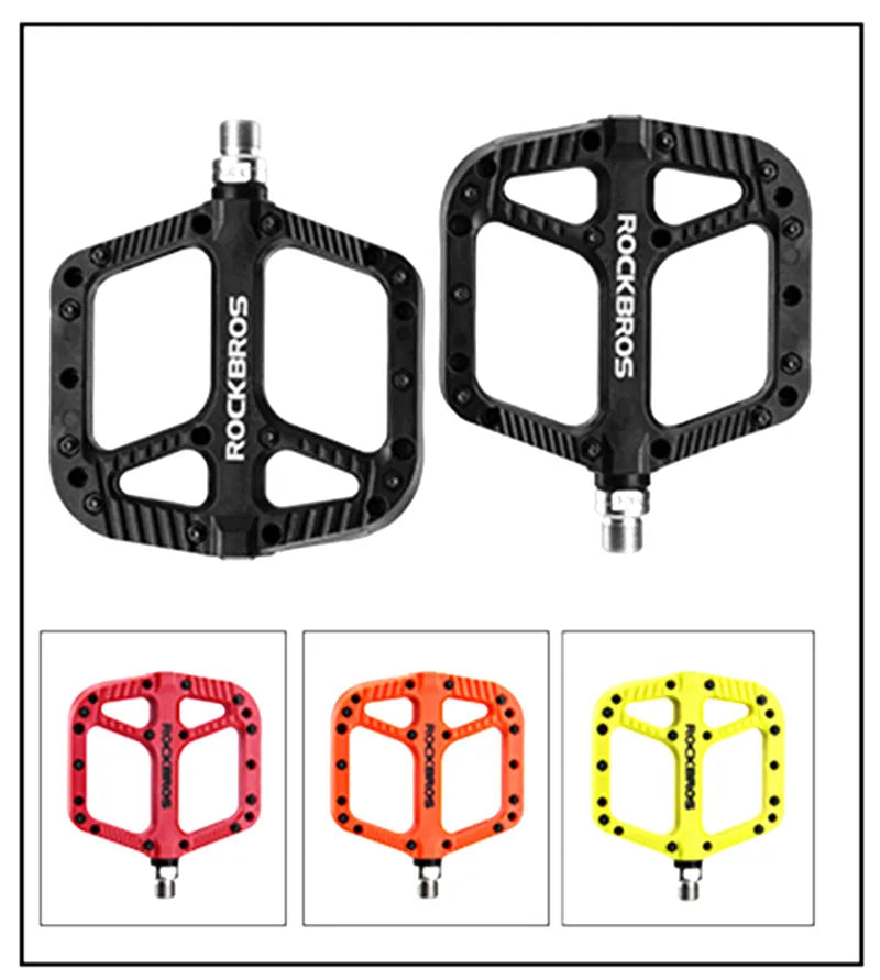 Road bicycle pedals with smooth sealed bearing rotation