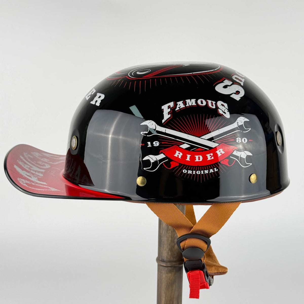 Rider Wearing Retro Open Face Helmet on Cafe Racer Motorcycle