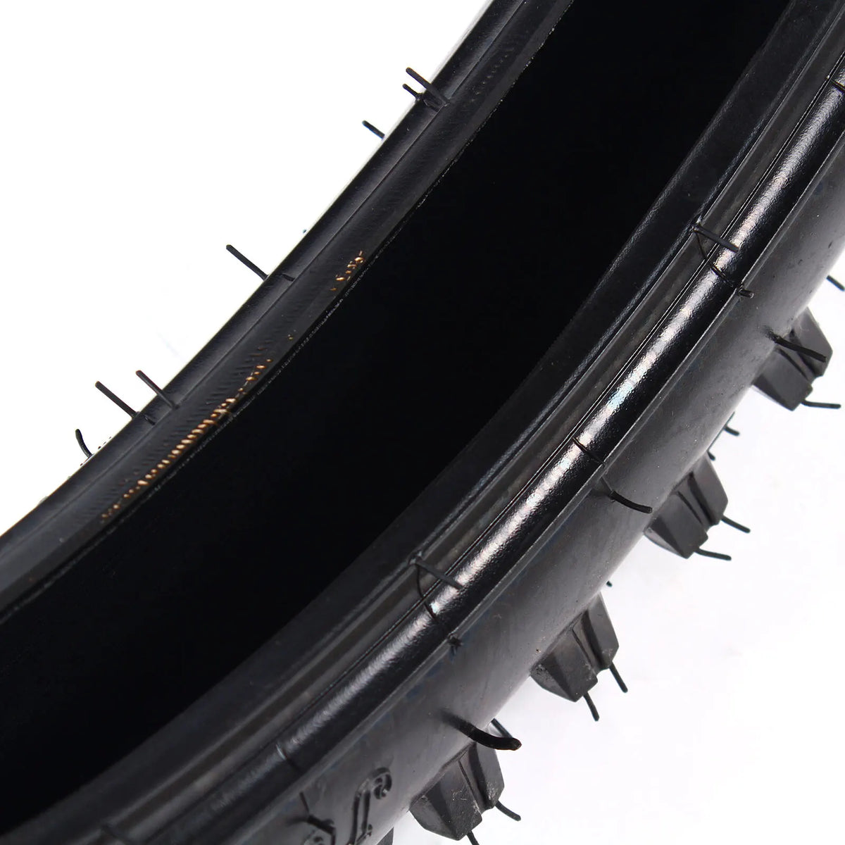 Side profile view showing 70/100-19 size markings on dirt bike tire sidewall