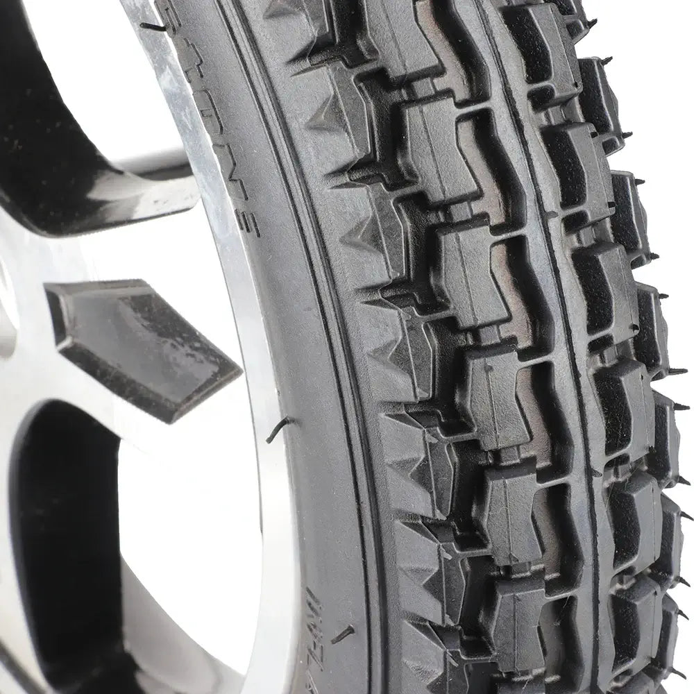 Smooth ride and strong grip wheelchair tire